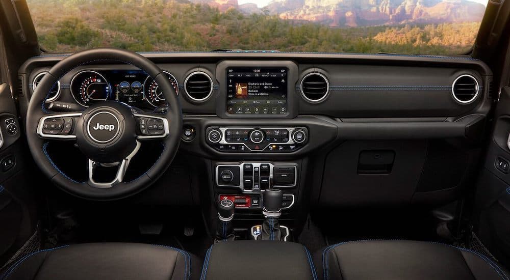 The black interior is shown on a 2021 Jeep Wrangler 4Xe Rubicon.
