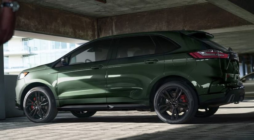 A green 2022 Ford Edge is shown from the side parked in a parking garage after winning a 2022 Ford Edge vs 2022 Chevy Blazer comparison.