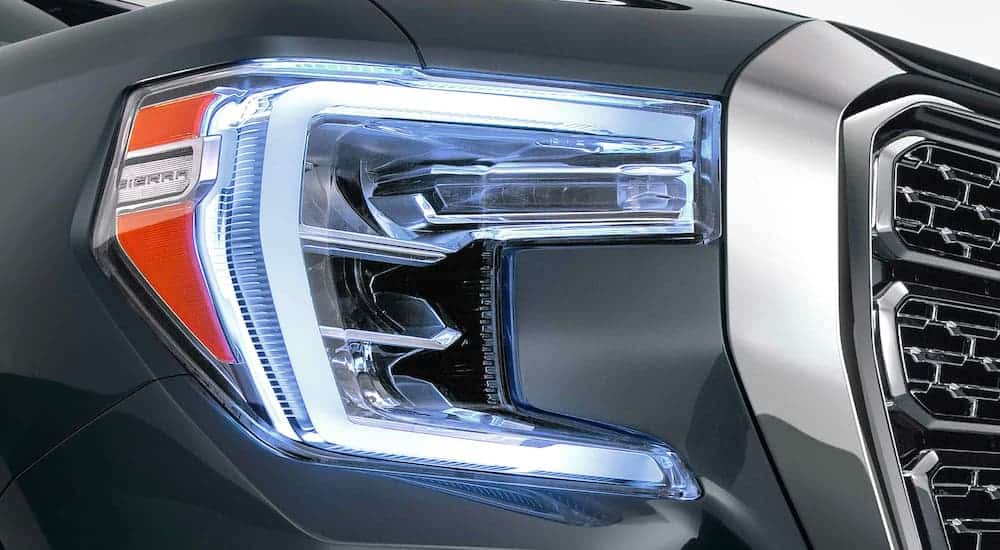 A close up shows the LED headlight on a gray 2021 GMC Sierra 1500.