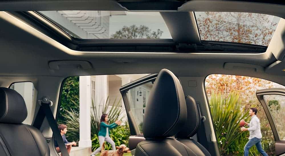 A close up shows the moonroof from the passenger side in a 2021 Nissan Rogue.