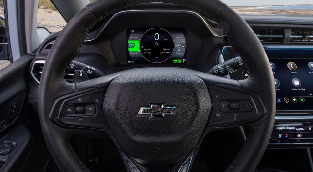 A closeup shows the steering wheel and information cluster in a 2022 Chevy Bolt EUV.