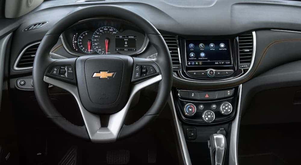 The steering wheel and screen in a 2019 Chevy Trax are shown.
