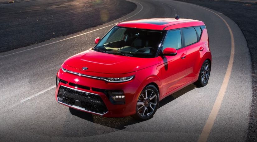 A red 2020 Kia Soul is angled on a track after leaving a used Kia dealer..