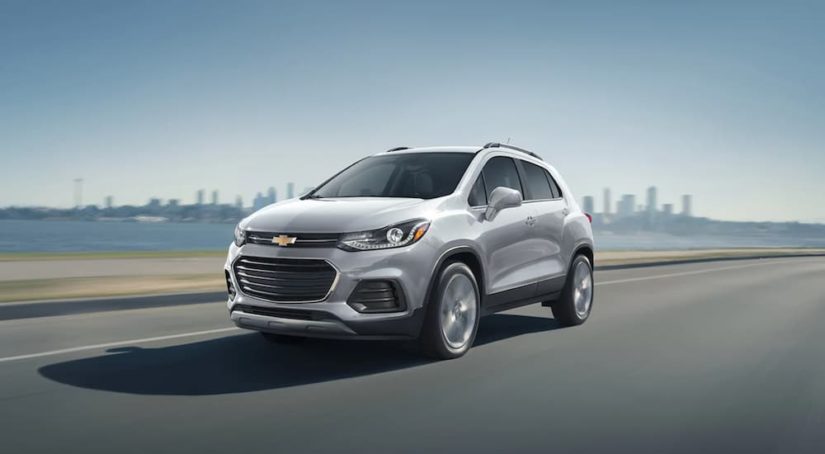 A 2021 Chevy Trax drives on an open road after winning a 2021 Chevy Trax vs 2021 Ford EcoSport comparison.