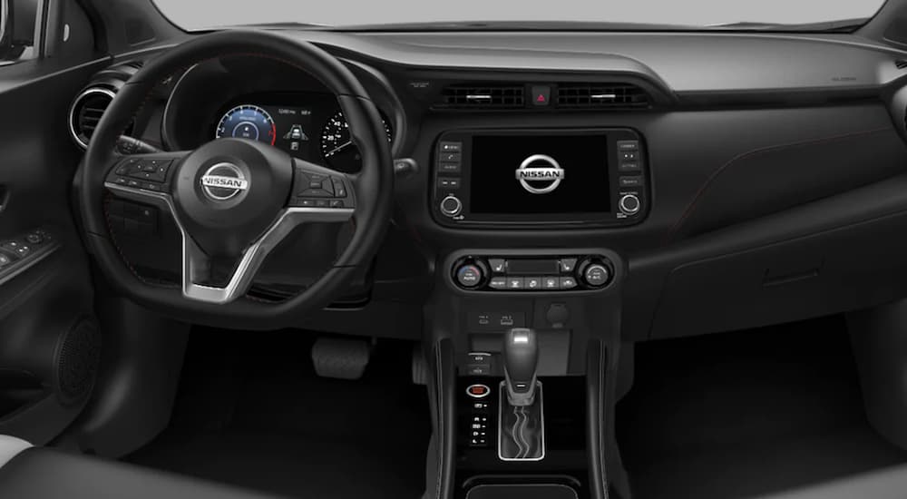 The interior of a 2021 Nissan Kicks is shown.