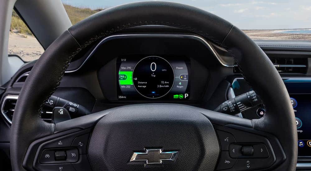 The steering wheel and digital gauge is shown on a 2022 Chevy Bolt EV.