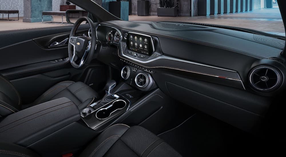 The black interior of a 2021 Chevy Blazer is shown.