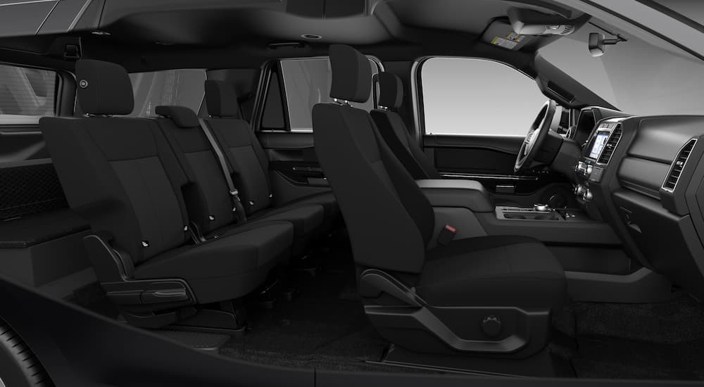 The black interior is shown from the side in a 2021 Ford Expedition XL SXT.