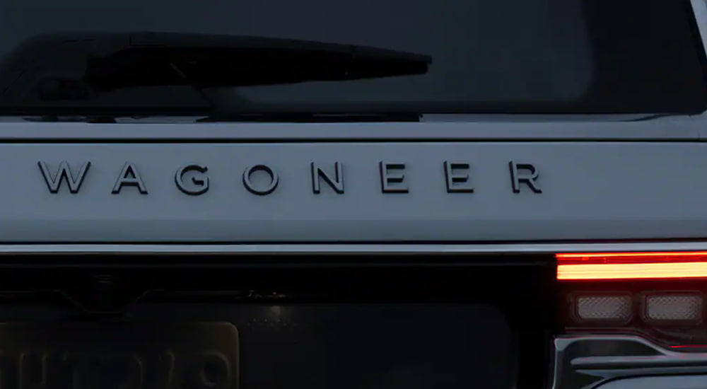 The 2022 Wagoneer Emblem is displayed at dusk.