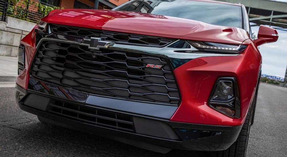 A red 2022 Chevy Blazer RS shows the front grille.