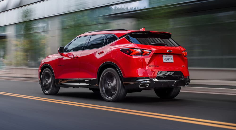 A red 2022 Chevy Blazer RS is shown driving from behind after winning a 2022 Chevy Blazer vs 2021 Nissan Murano comparison.