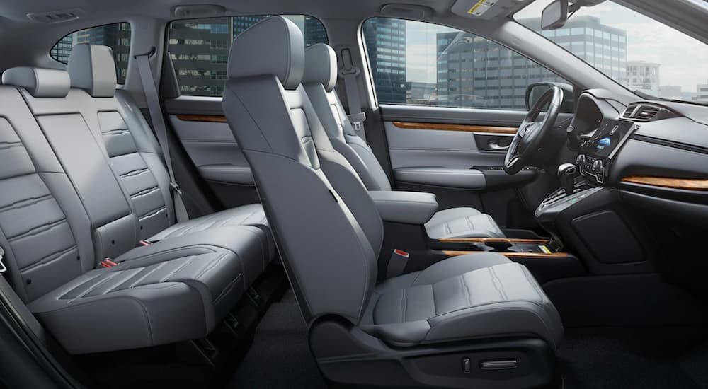 A grey 2020 Honda CR-V shows two rows of seating.