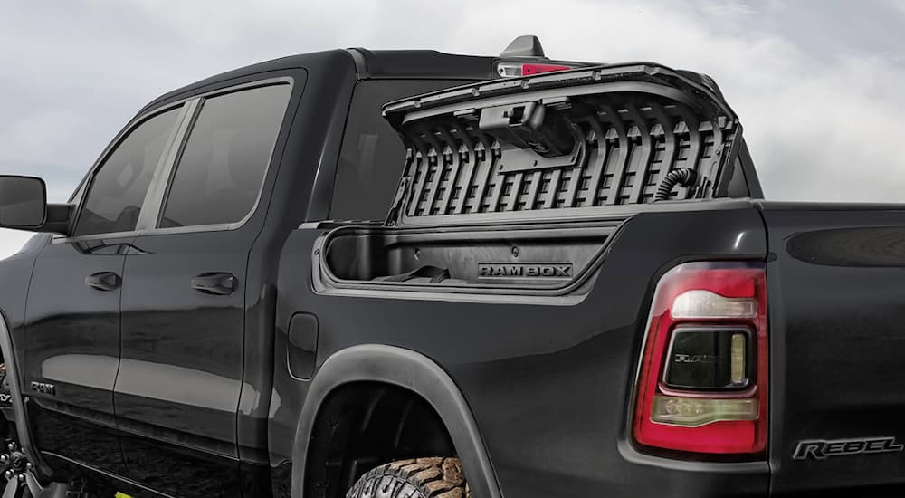 The open RamBox is shown on a black 2020 Ram 1500 Rebel.