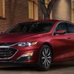 A red 2022 Chevy Malibu is shown from the front.