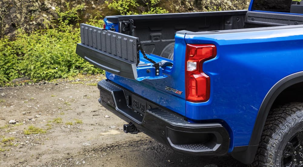 A close up shows the Multi-Flex Tailgate on a blue 2022 Chevy Silverado 1500 ZR2.