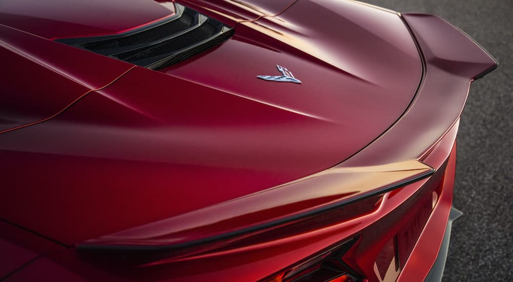 A close up shows the spoiler on a maroon 2023 Chevy Corvette Z06.