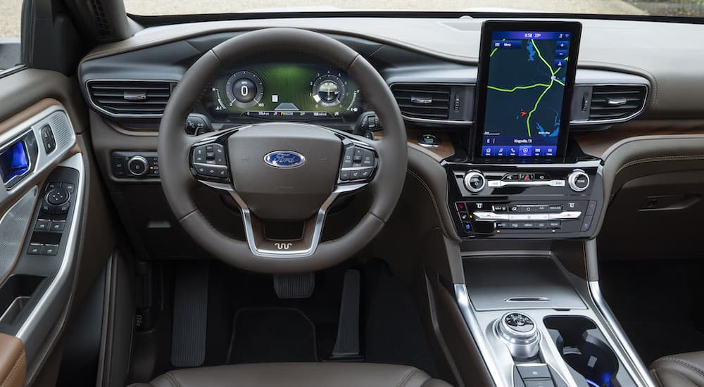 The interior of a 2022 Ford Explorer King Ranch is shown from the drivers seat.