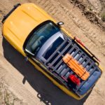 A yellow 2022 Ford Bronco Sport Badlands is shown from an aerial view on a dirt path after winning a off-road showdown between the 2022 Ford Bronco Sport vs 2022 Honda HR-V.