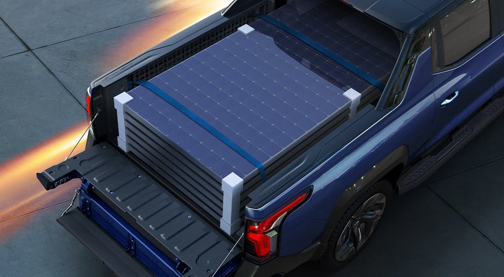 A close up of a full payload in the bed of a blue 2024 Chevy Silverado EV is shown.