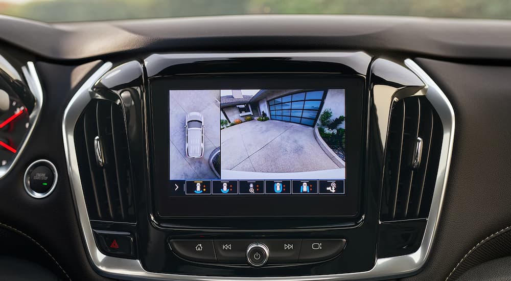 The back up camera system is shown on the 2022 Chevy Traverse.