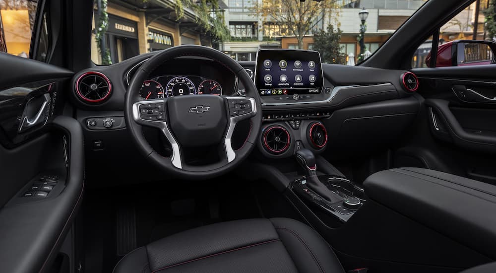The black interior of a 2023 Chevy Blazer RS is shown from the drivers seat.