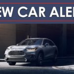A grey 2023 Honda HR-V Sport is shown on a city street under a new car alert banner.