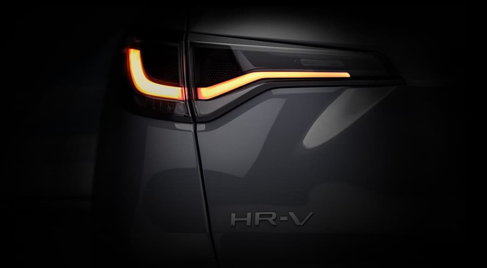 A close up shows the driver side taillight on a silver 2023 Honda HR-V.
