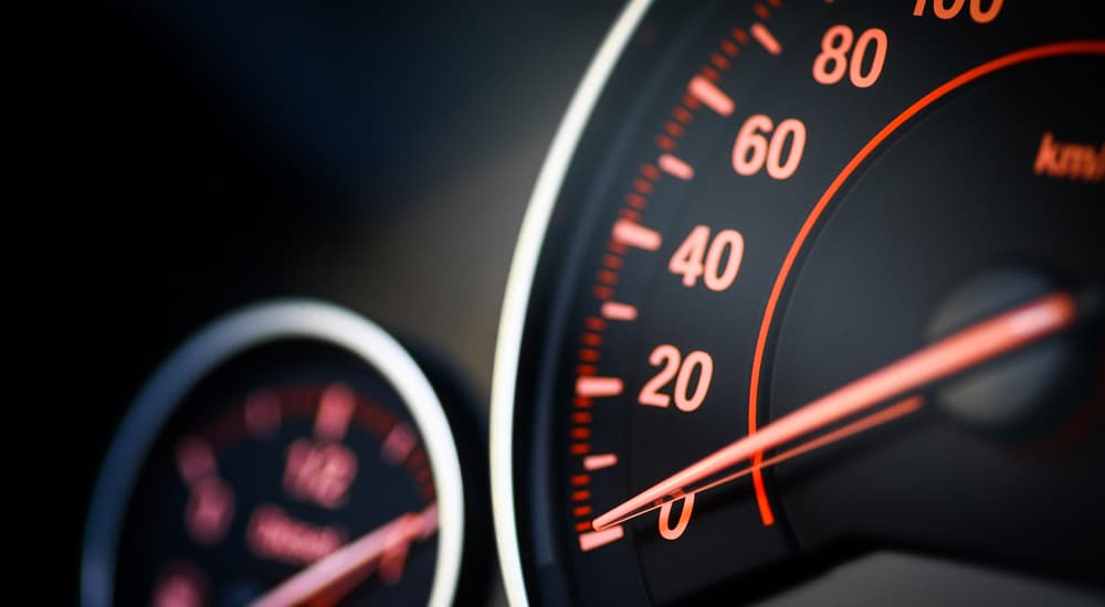 A close up of a speedometer is shown.