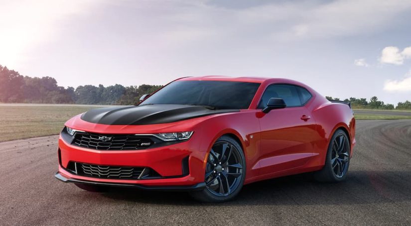 A red 2020 Chevy Camaro SS is shown from the front at an angle after the owner searched 'Certified Pre-Owned vehicles'.