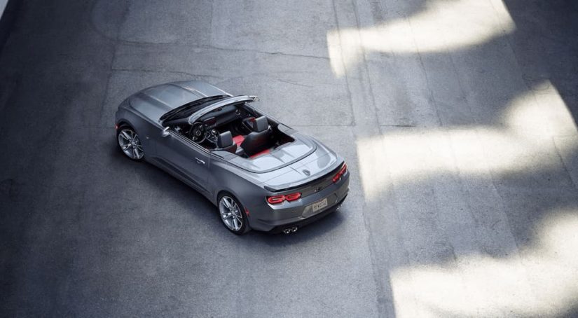 A silver 2022 Chevy Camaro Convertible is shown from a high angle.