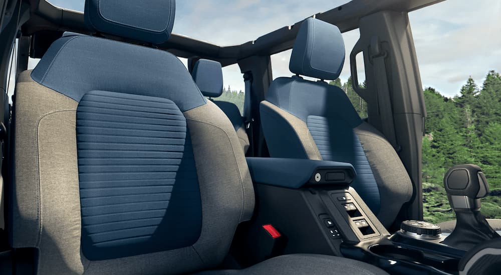 The blue and gray seating of a 2022 Ford Bronco Outer Banks is shown.