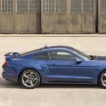 A blue 2022 Ford Mustang GT C/S is shown from the side after leaving a Ford Dealership.