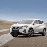 A white 2022 Nissan Murano is shown parked on an airstrip.