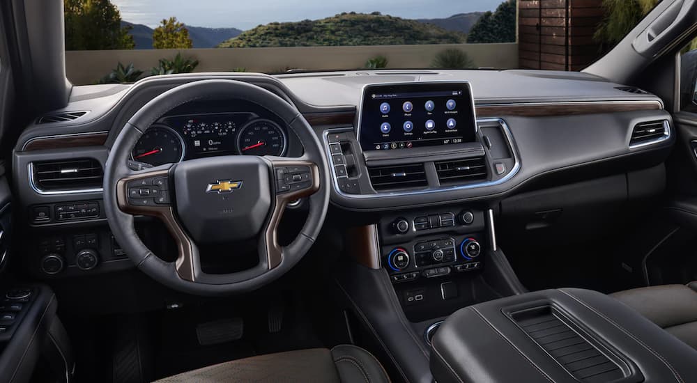 The interior of a 2022 Chevy Suburban is shown from the drivers seat.