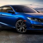 A blue 2020 Honda Civic is shown from the front after the owner searched for 'Used cars Champaign IL'.