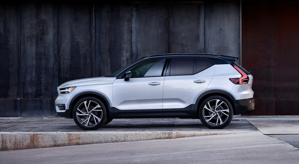 A white 2020 Volvo XC40 is shown from the side while parked.
