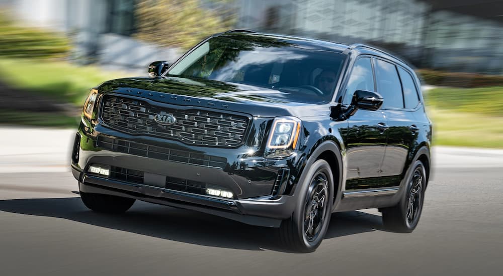 A black 2022 Kia Telluride is shown from the front.