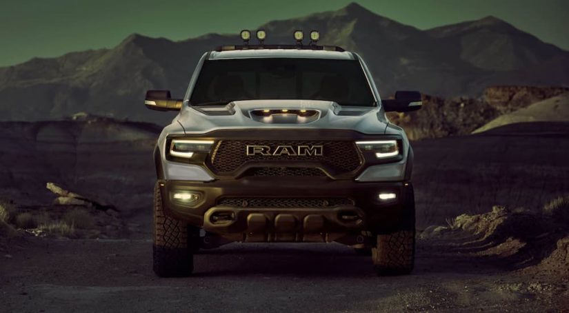 A grey 2022 Ram 1500 TRX is shown from the front after the owner searched 'Ram truck lease'.