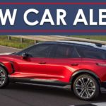 A red 2024 Chevy Blazer EV is shown from the side parked on a track.