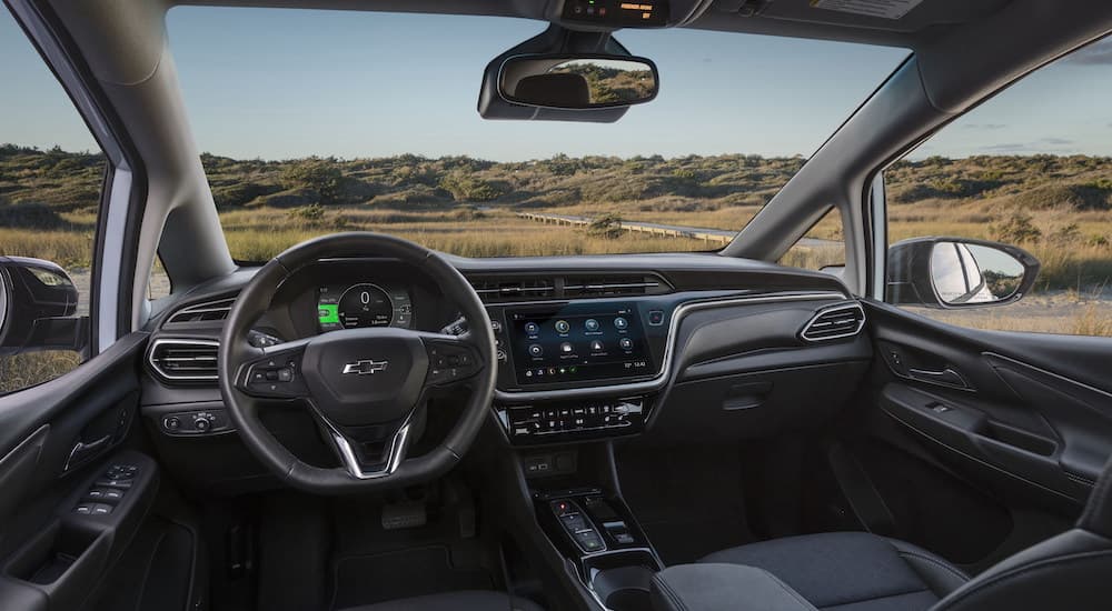 The interior of a 2023 Chevy Bolt EV is shown from the drivers seat.