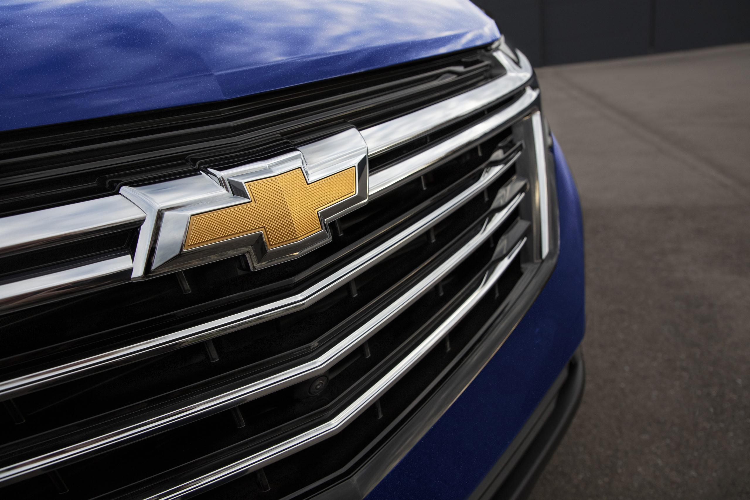 A close up of the grille on a blue 2022 Chevy Equinox LS is shown.