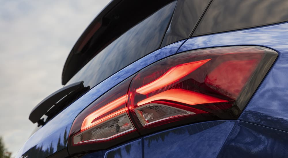 A close up of the rear taillight of a blue 2022 Chevy Equinox LS is shown.