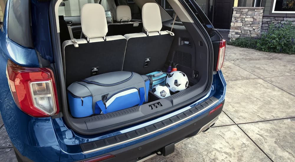 A close up of the rear cargo area of a blue 2022 Ford Explorer is shown.