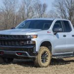 A grey 2022 Chevy Silverado 1500 Custom Trail Boss is shown from the front at an angle.