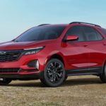 A red 2022 Chevy Equinox RS is shown from the front at an angle.