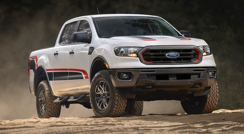 A white 2022 Ford Ranger Tremor is shown from the front at an angle after leaving a dealer that advertise having a Ford Ranger for sale near you.