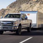 A white 2022 Ford F-350 Platinum is shown from the front