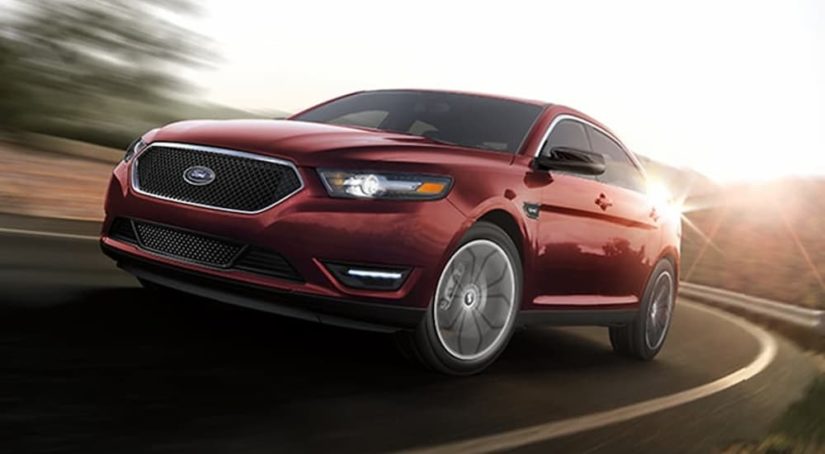 A red 2019 Ford Taurus is shown after viewing certified Fords for sale.