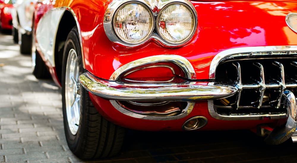 A classic car is shown in close up.