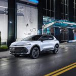 A white 2024 Chevy Equinox EV is shown from the front at an angle after leaving a Chevy Equinox EV dealer.